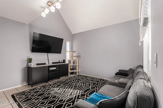 a living room with furniture and a couch