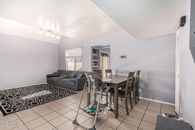 a view of a dining room with furniture