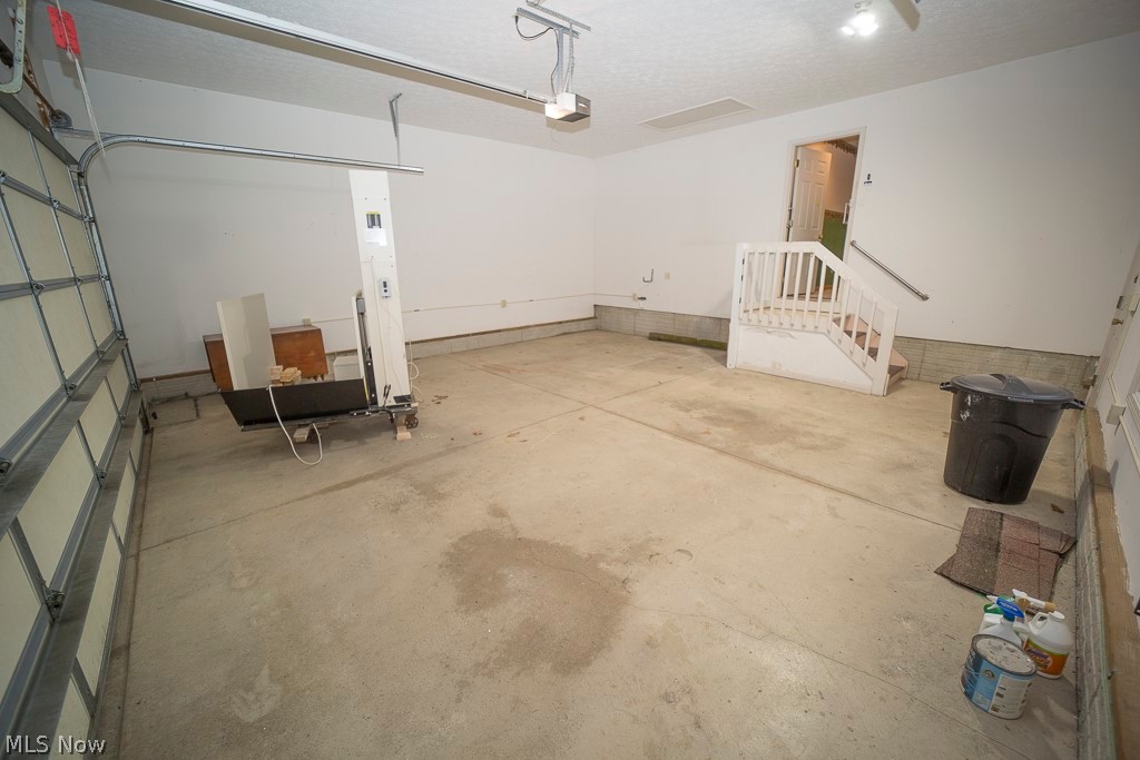 48120 Cooper Foster Park Road Amherst, OH 44001 - Photo 28 of 29 Nice 2 car garage with landing