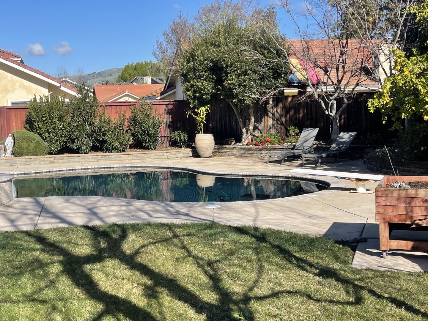 3411 Ruby Court San Jose, CA 95148 - Photo 5 of 12 a view of a swimming pool with a patio