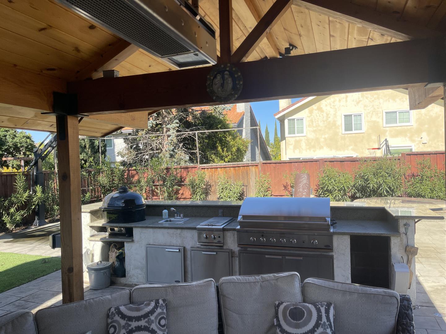 3411 Ruby Court San Jose, CA 95148 - Photo 6 of 12 a kitchen with a table chairs and a barbeque