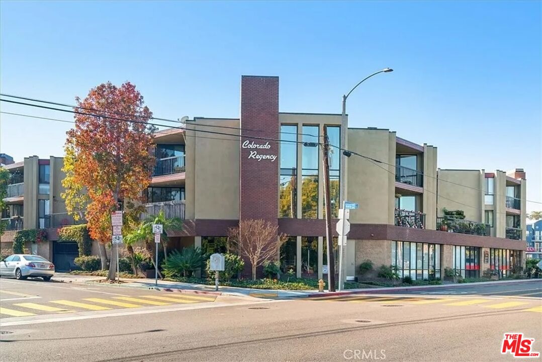 5190 East Colorado Street, Unit 210 Long Beach, CA 90814 - Photo 1 of 14 a front view of a building with street view