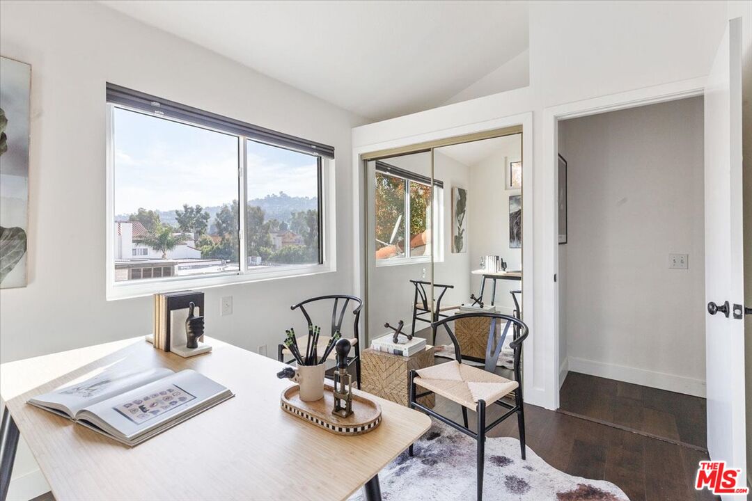 10960 Bluffside Drive, Unit 201 Studio City, CA 91604 - Photo 19 of 23 a view of a workspace with furniture and a window