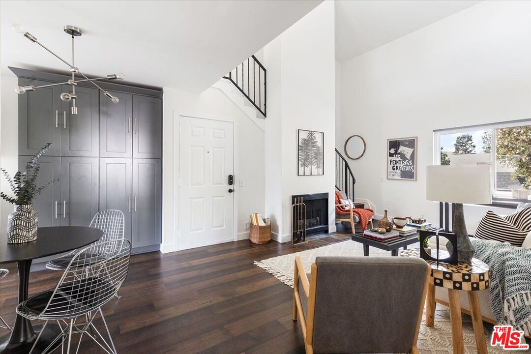 10960 Bluffside Drive, Unit 201 Studio City, CA 91604 - Photo 3 of 23 a living room with furniture and a fireplace