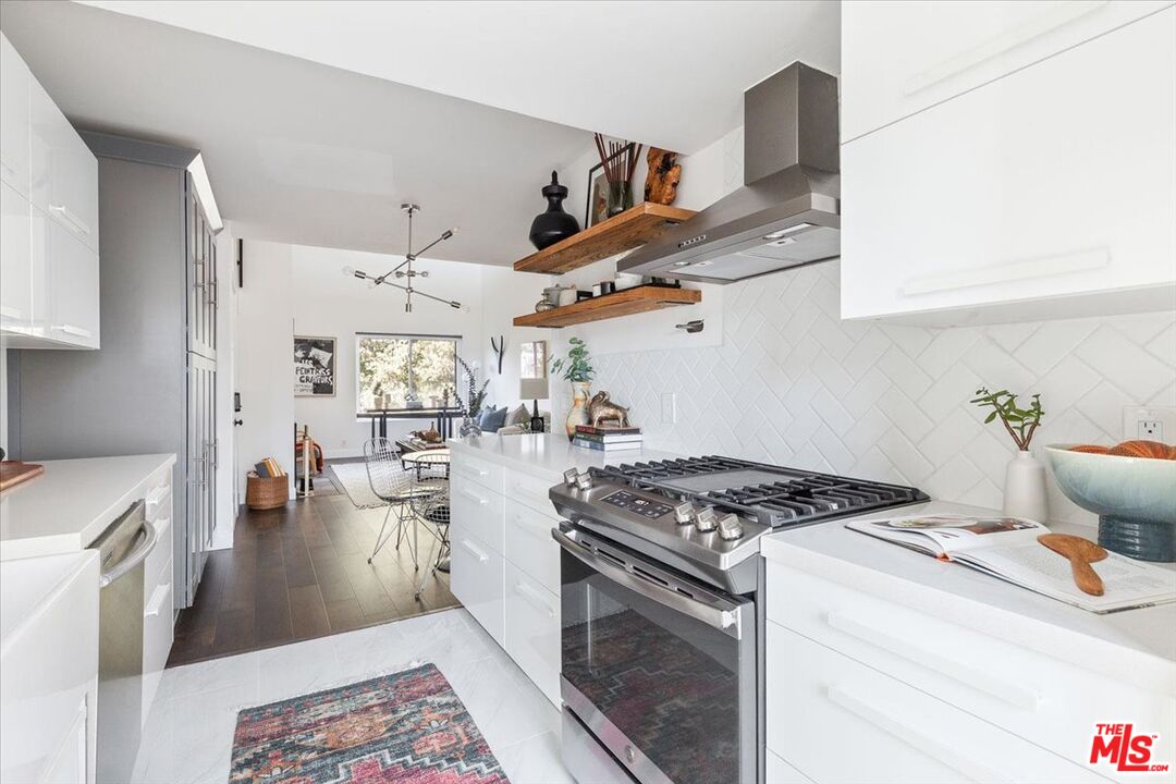 10960 Bluffside Drive, Unit 201 Studio City, CA 91604 - Photo 10 of 23 a kitchen with stove and cabinets