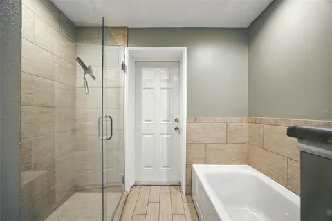 a view of a livingroom with a flat screen tv