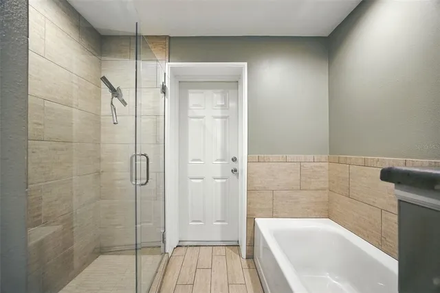 a view of a livingroom with a flat screen tv