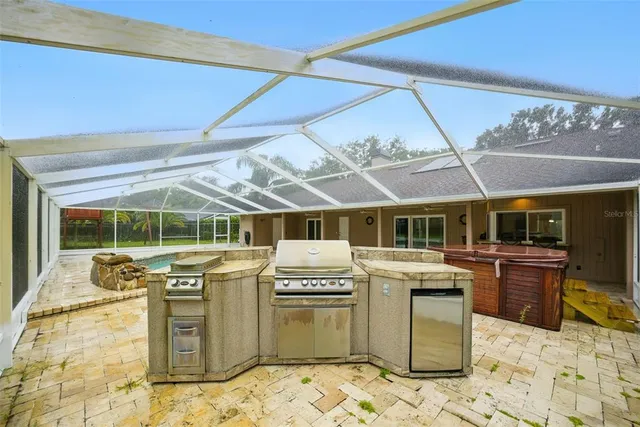 a view of a backyard with large trees