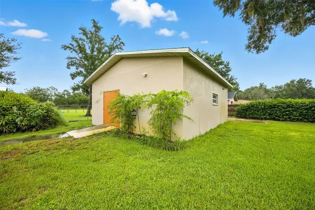 a view of a livingroom with wooden floor