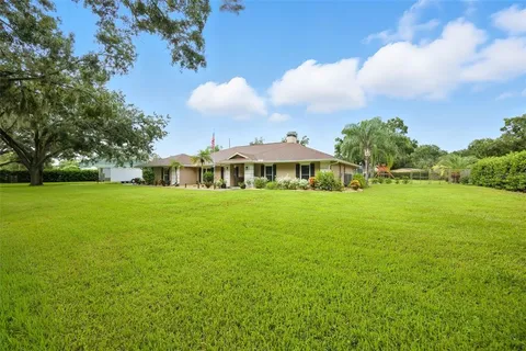 a aerial view of a house with garden