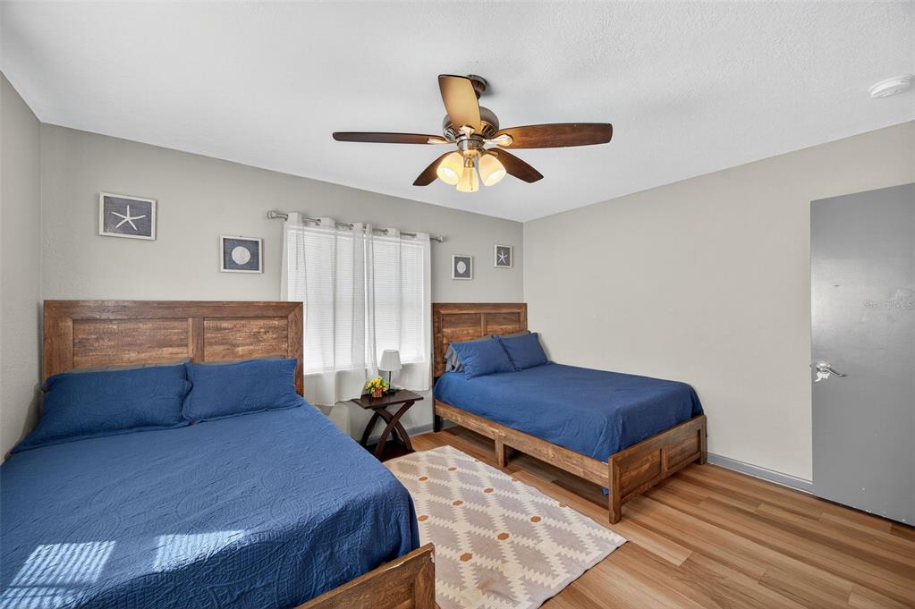 1576 Rosery Road Northeast Largo, FL 33756 - Photo 33 of 54 a bedroom with a bed and window