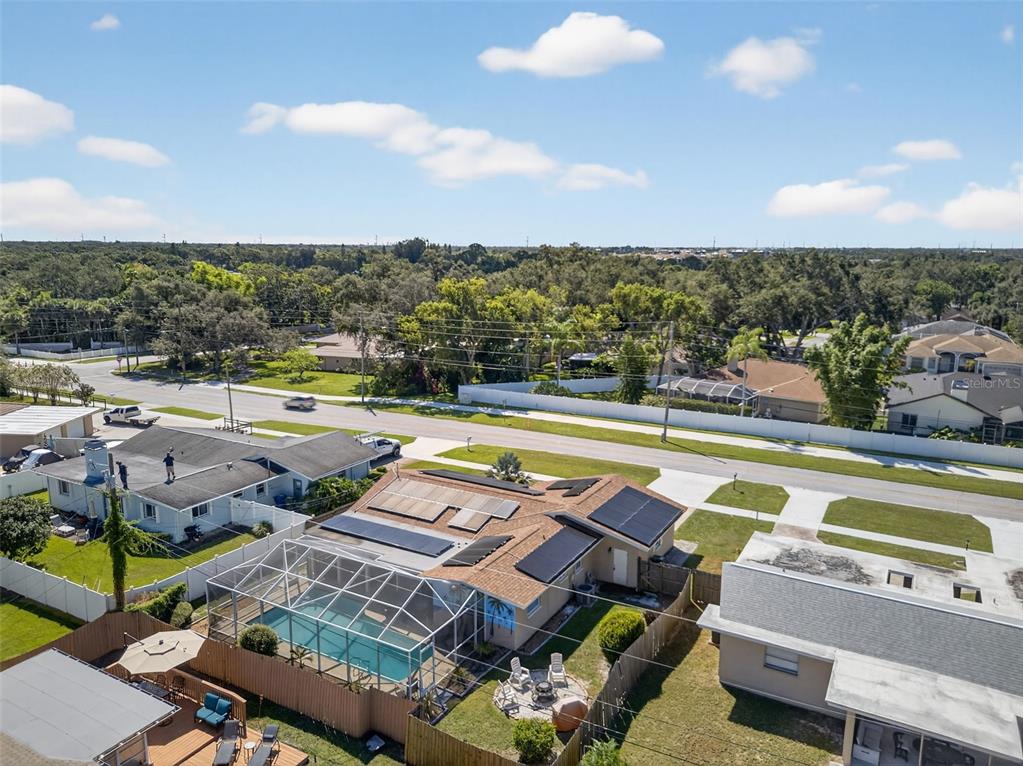 1576 Rosery Road Northeast Largo, FL 33756 - Photo 54 of 54 a view of swimming pool with outdoor seating and city view