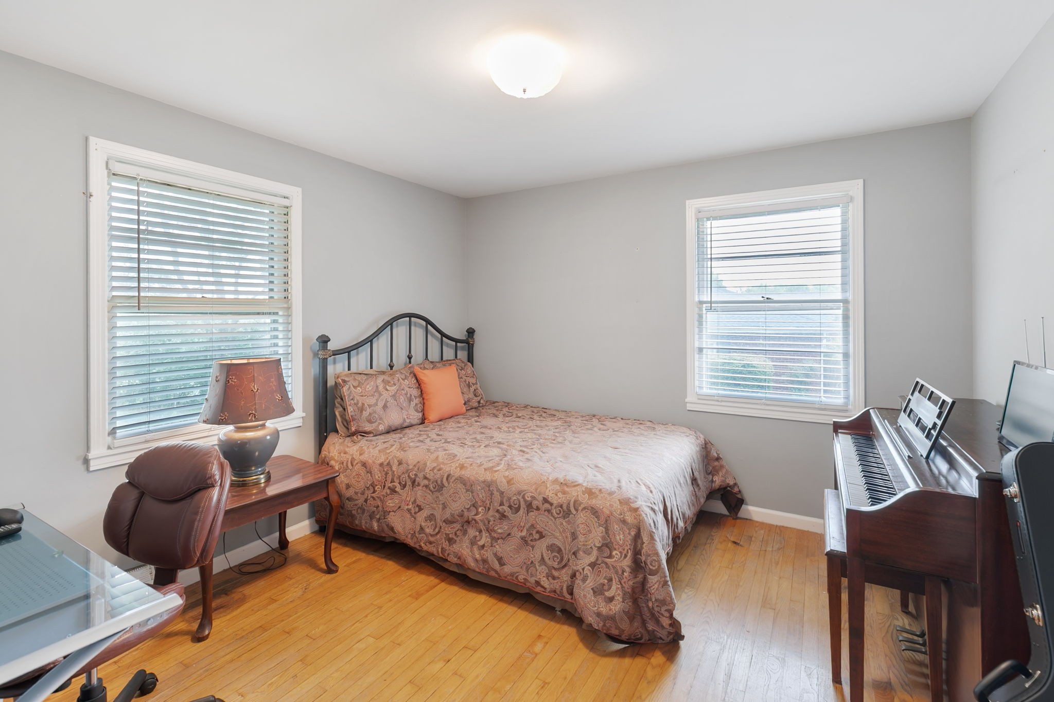 307 Shepherd Hills Drive Madison, TN 37115 - Photo 19 of 30 a bedroom with a bed chair and window