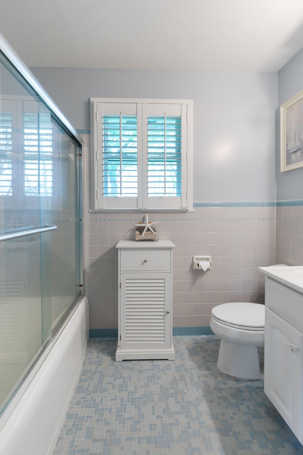 307 Shepherd Hills Drive Madison, TN 37115 - Photo 22 of 30 a bathroom with a sink a toilet and shower