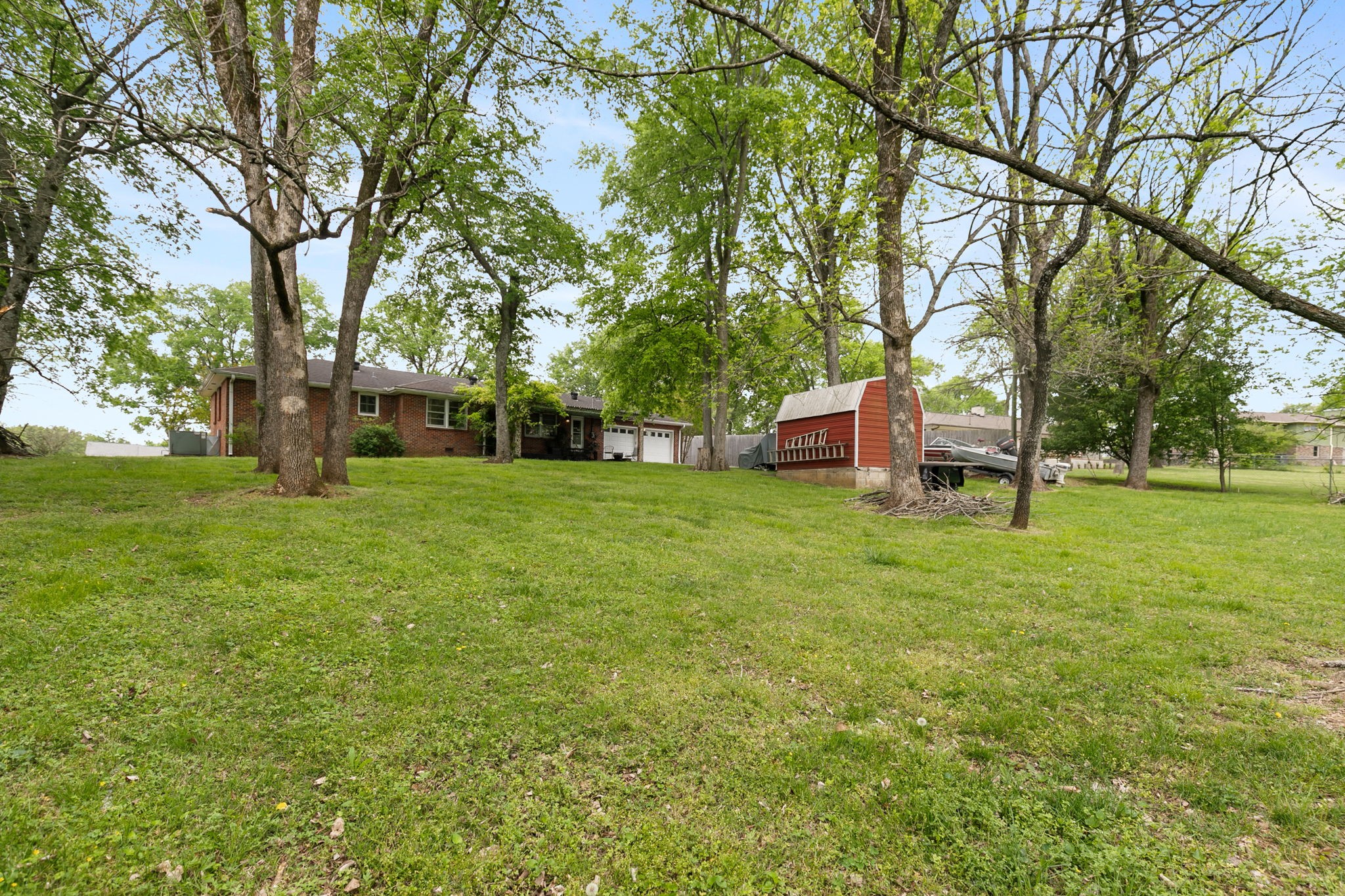 307 Shepherd Hills Drive Madison, TN 37115 - Photo 27 of 30 a view of a tree in front of a house