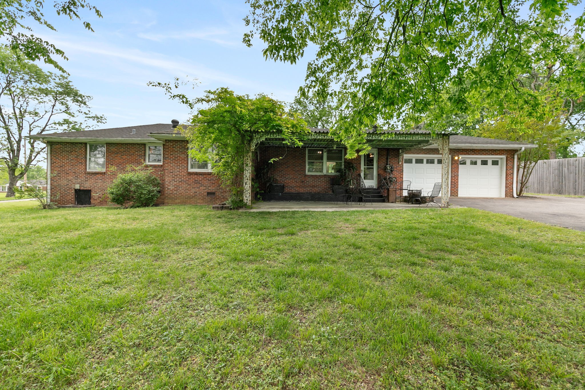 307 Shepherd Hills Drive Madison, TN 37115 - Photo 28 of 30 a front view of house with yard and trees