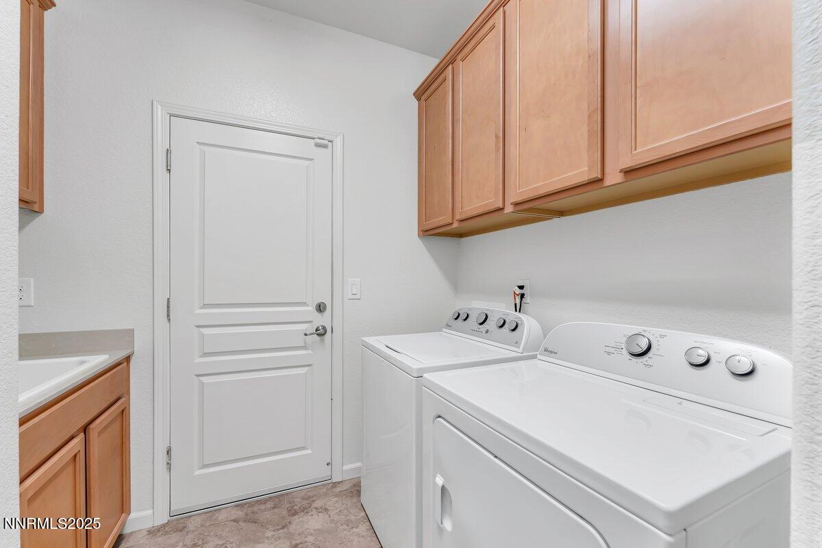 861 Larrimore Trail Reno, NV 89523 - Photo 16 of 24 a utility room with dryer and washer