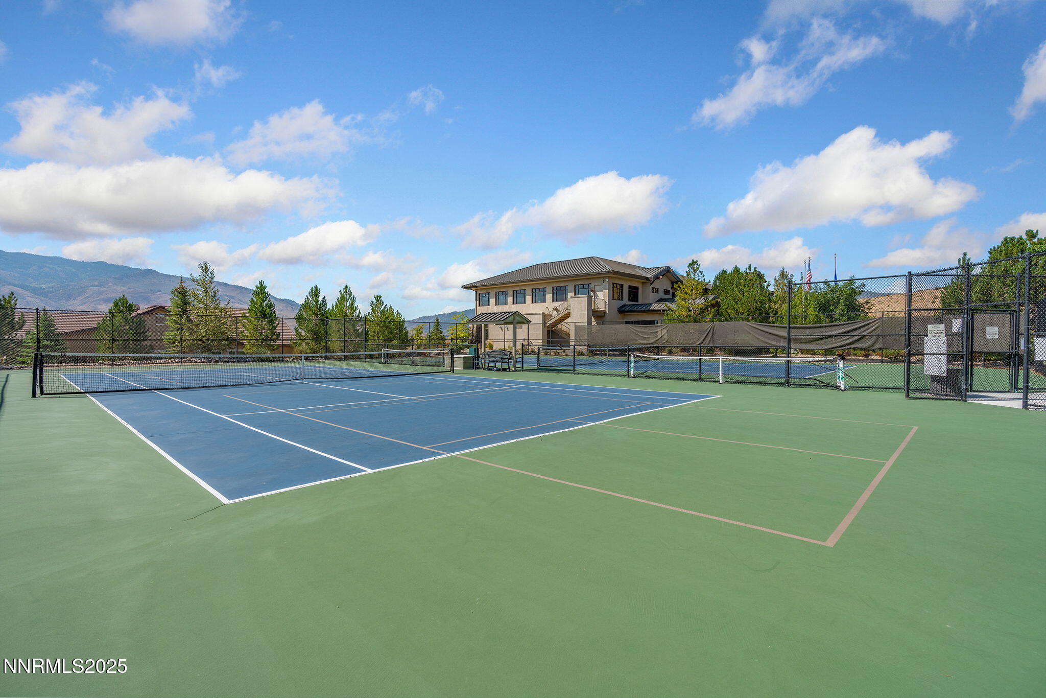 861 Larrimore Trail Reno, NV 89523 - Photo 23 of 24 a view of an outdoor space and tennis court
