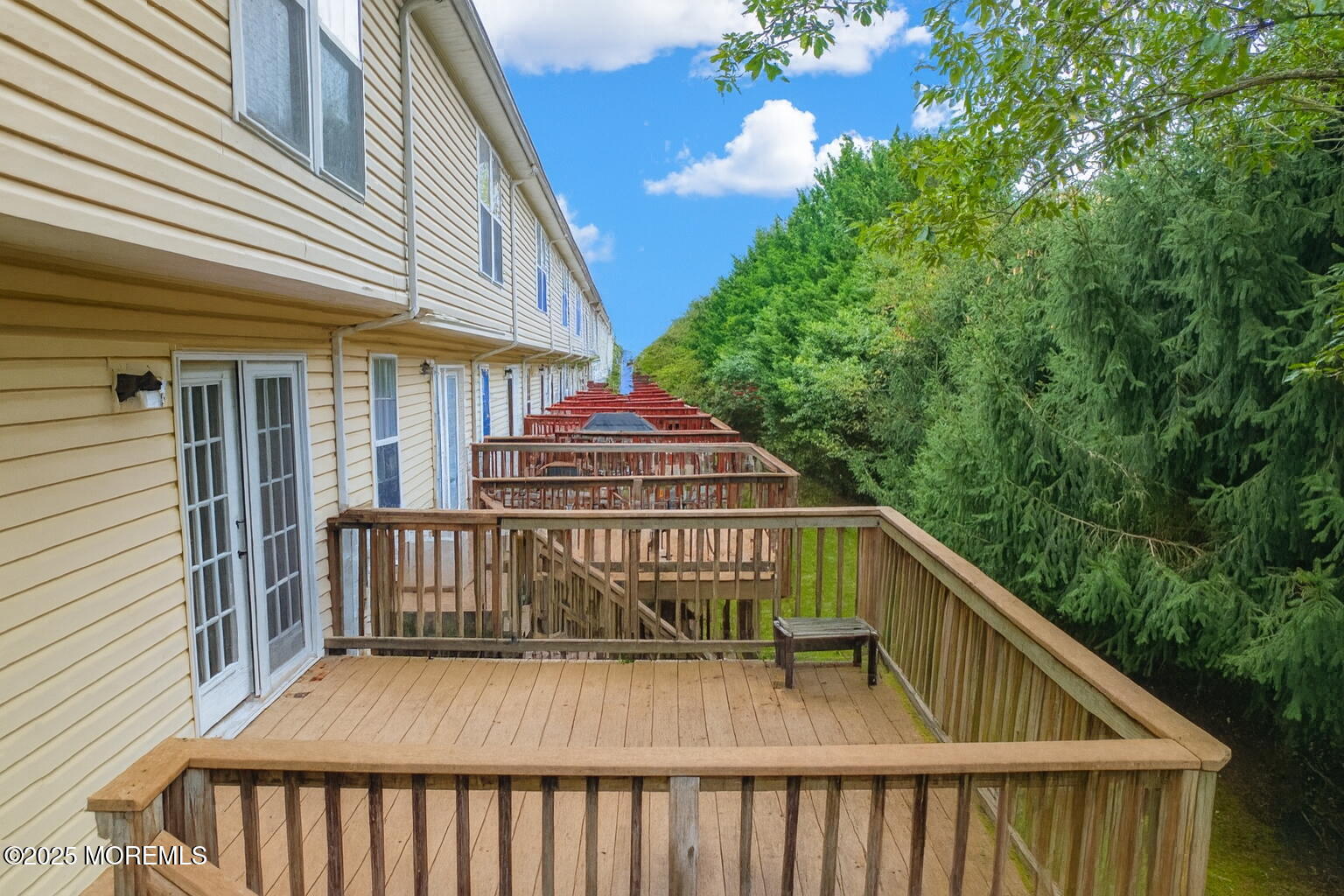 67 Saxton Road Farmingdale, NJ 07727 - Photo 38 of 41 a view of staircase with a deck and a garden