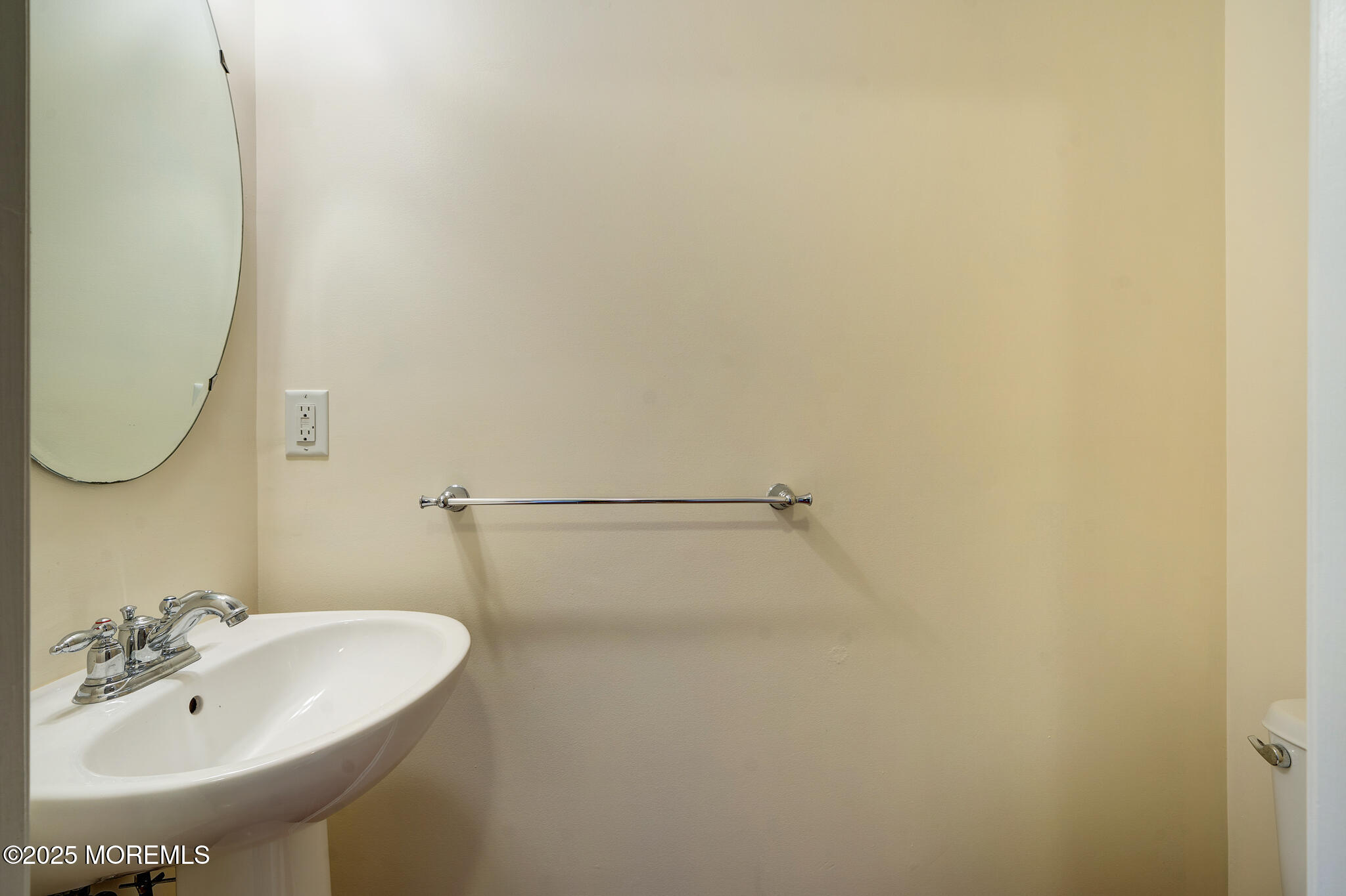 67 Saxton Road Farmingdale, NJ 07727 - Photo 8 of 41 a bathroom with a sink and a mirror