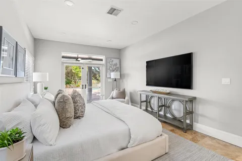 a kitchen with a stove top oven sink and cabinets