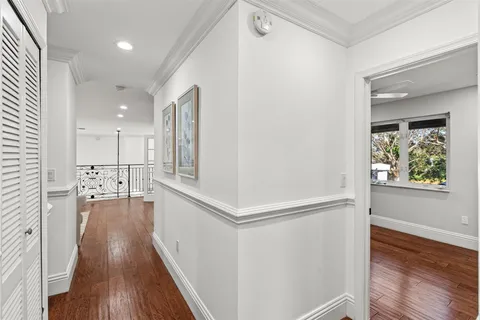 a house with swimming pool in front of it