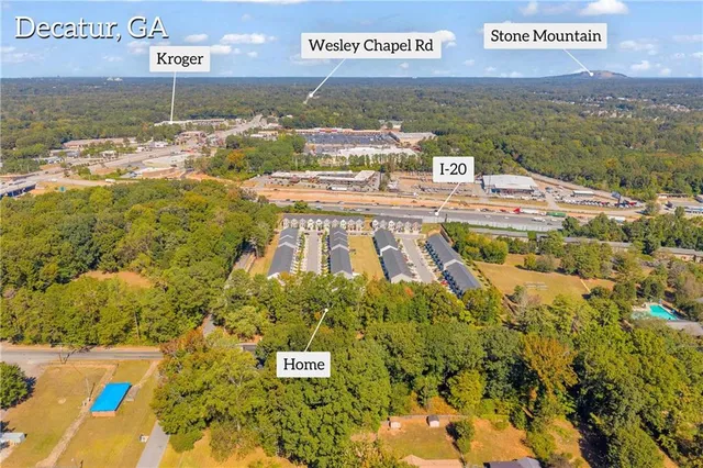 a view of a city with an ocean view