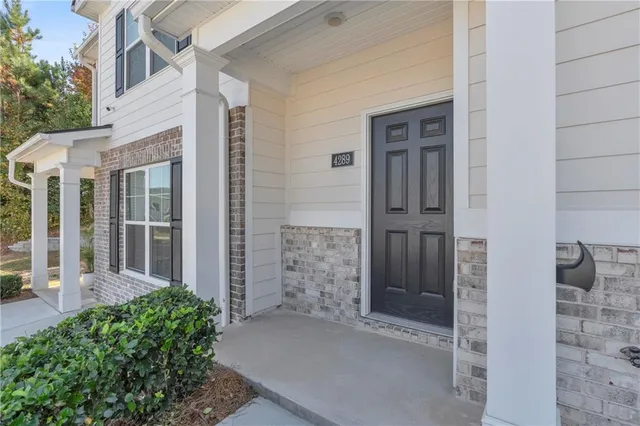 front view of a house with a glass door