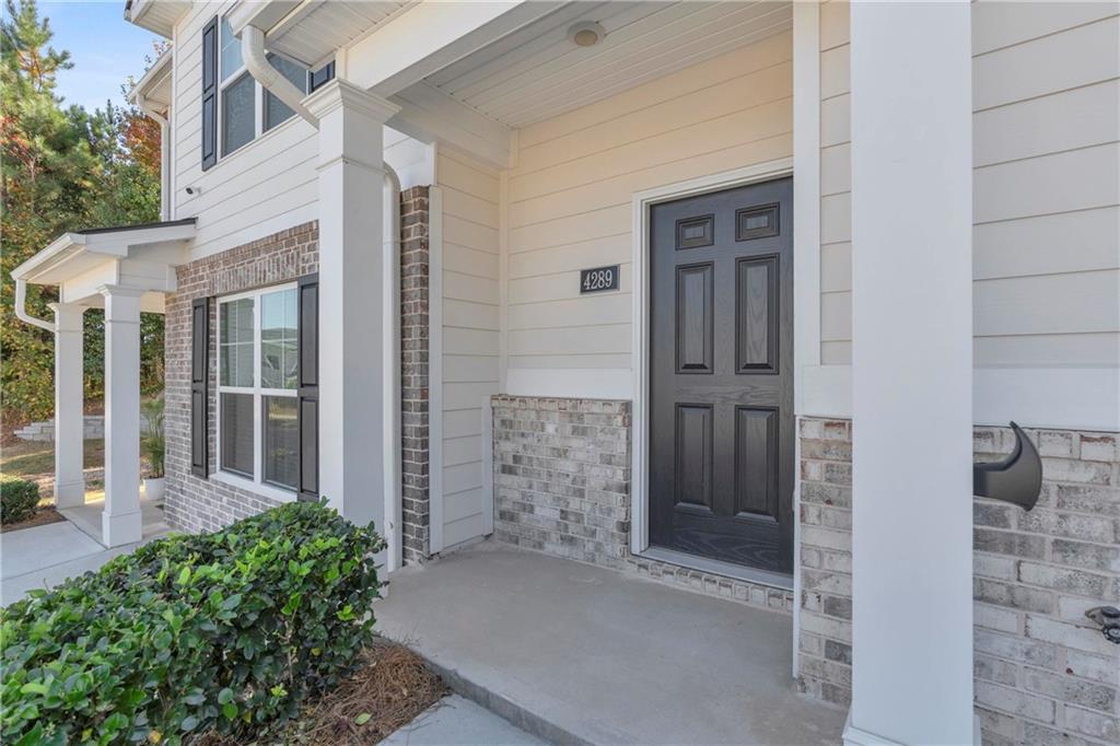 4289 Arcadia Drive Decatur, GA 30034 - Photo 7 of 11 front view of a house with a glass door