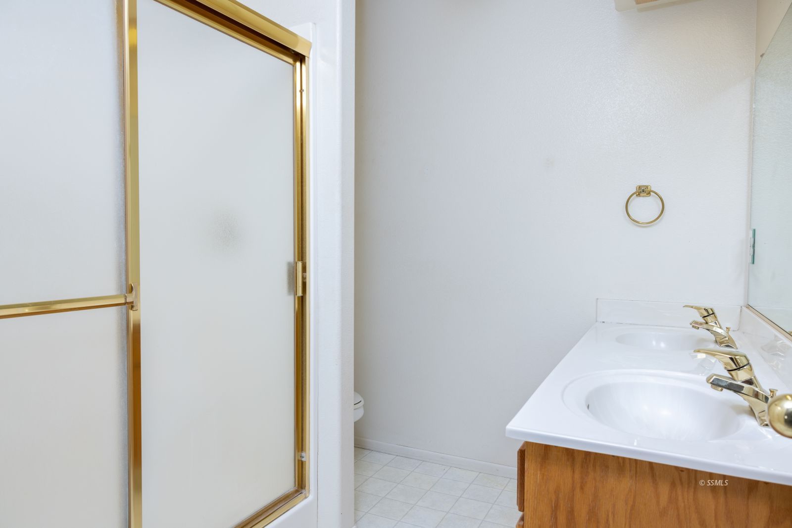1359 Maturango Street Ridgecrest, CA 93555 - Photo 24 of 38 a bathroom with a sink and a mirror