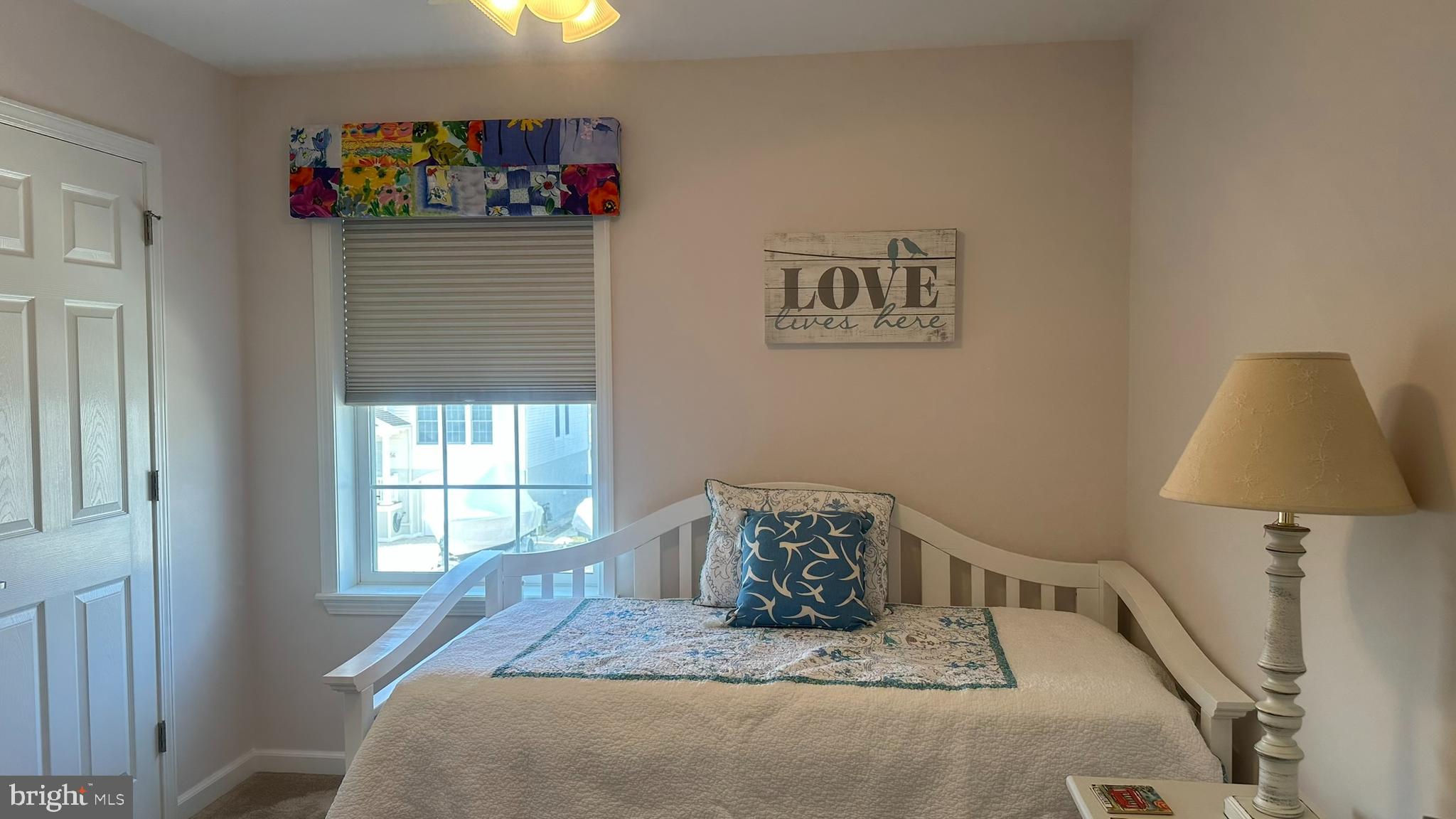 59 Weaver Drive Manahawkin, NJ 08050 - Photo 15 of 27 a bedroom with a bed and a window