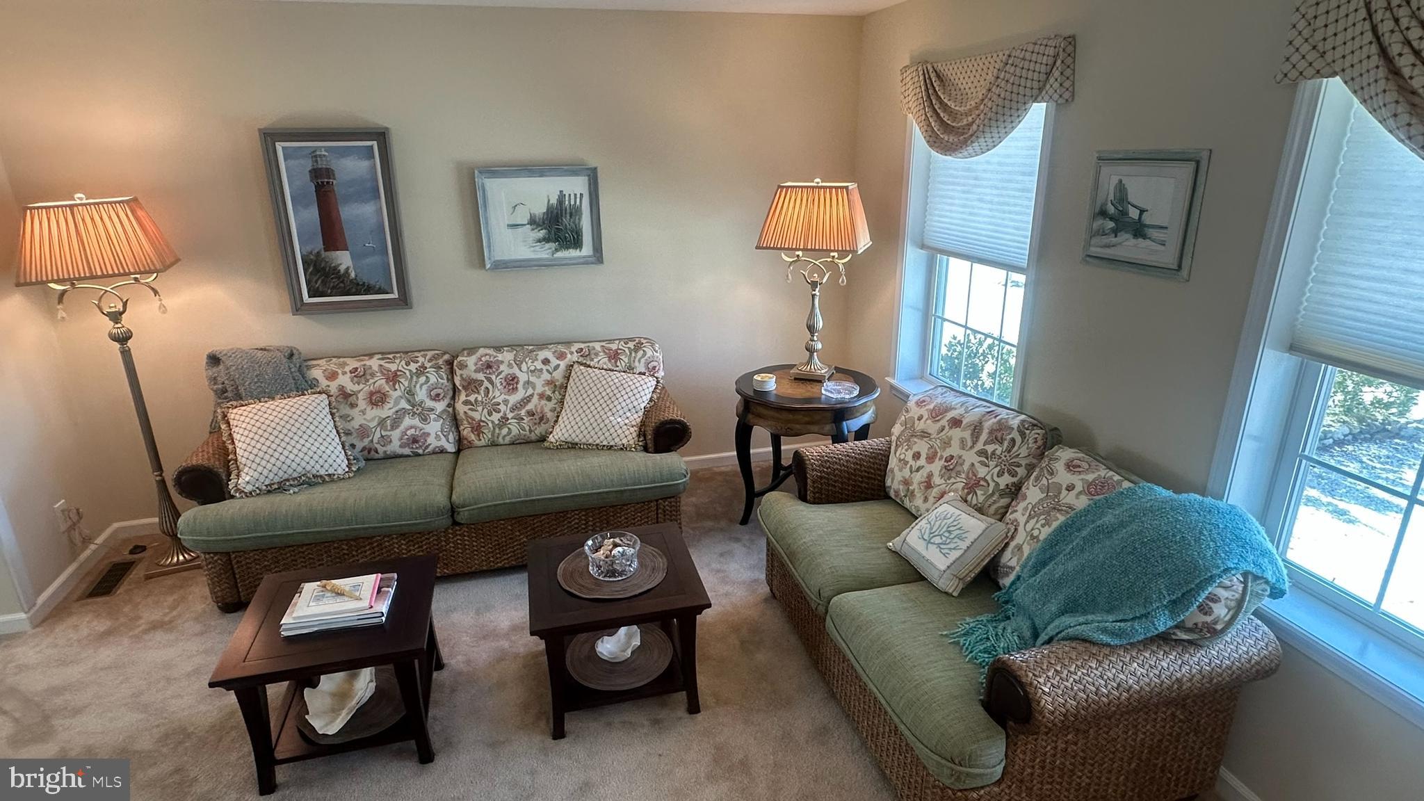 59 Weaver Drive Manahawkin, NJ 08050 - Photo 8 of 27 a living room with furniture and a window