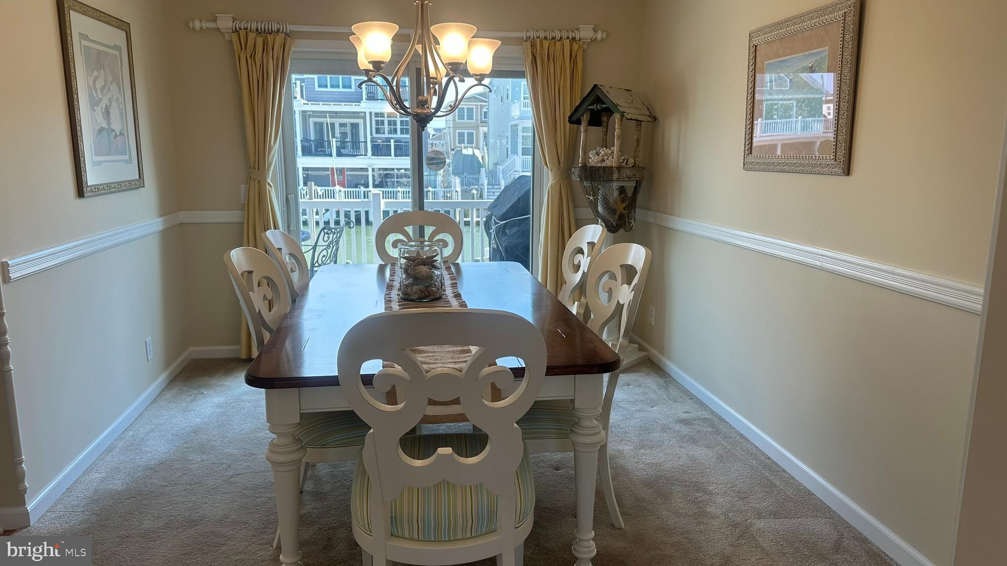 59 Weaver Drive Manahawkin, NJ 08050 - Photo 9 of 27 a view of a dining room with furniture and chandelier