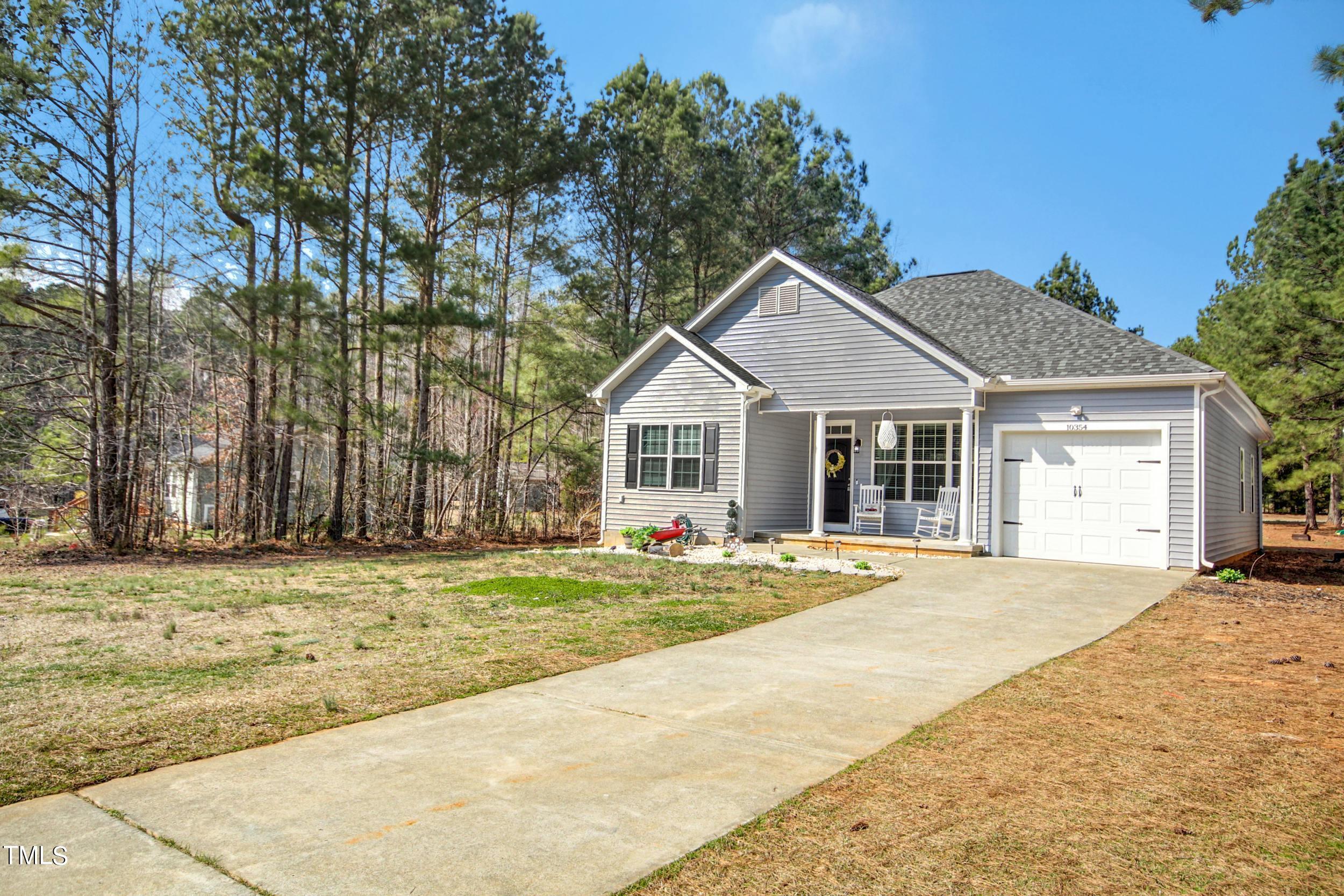 10354 Pasture Road Middlesex, NC 27557 - Photo 3 of 26 a front view of a house with a yard