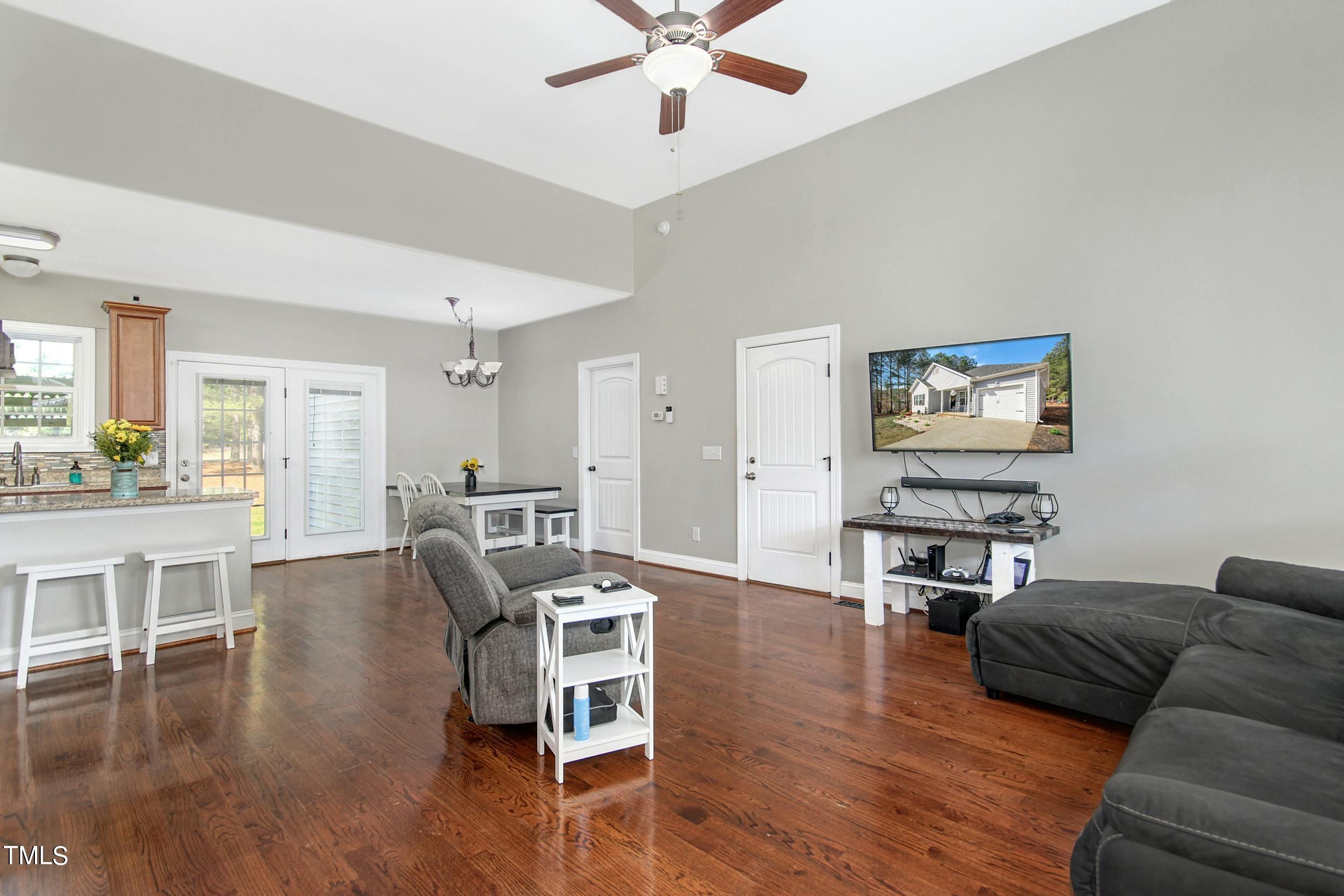 10354 Pasture Road Middlesex, NC 27557 - Photo 5 of 26 a living room with furniture and a wooden floor