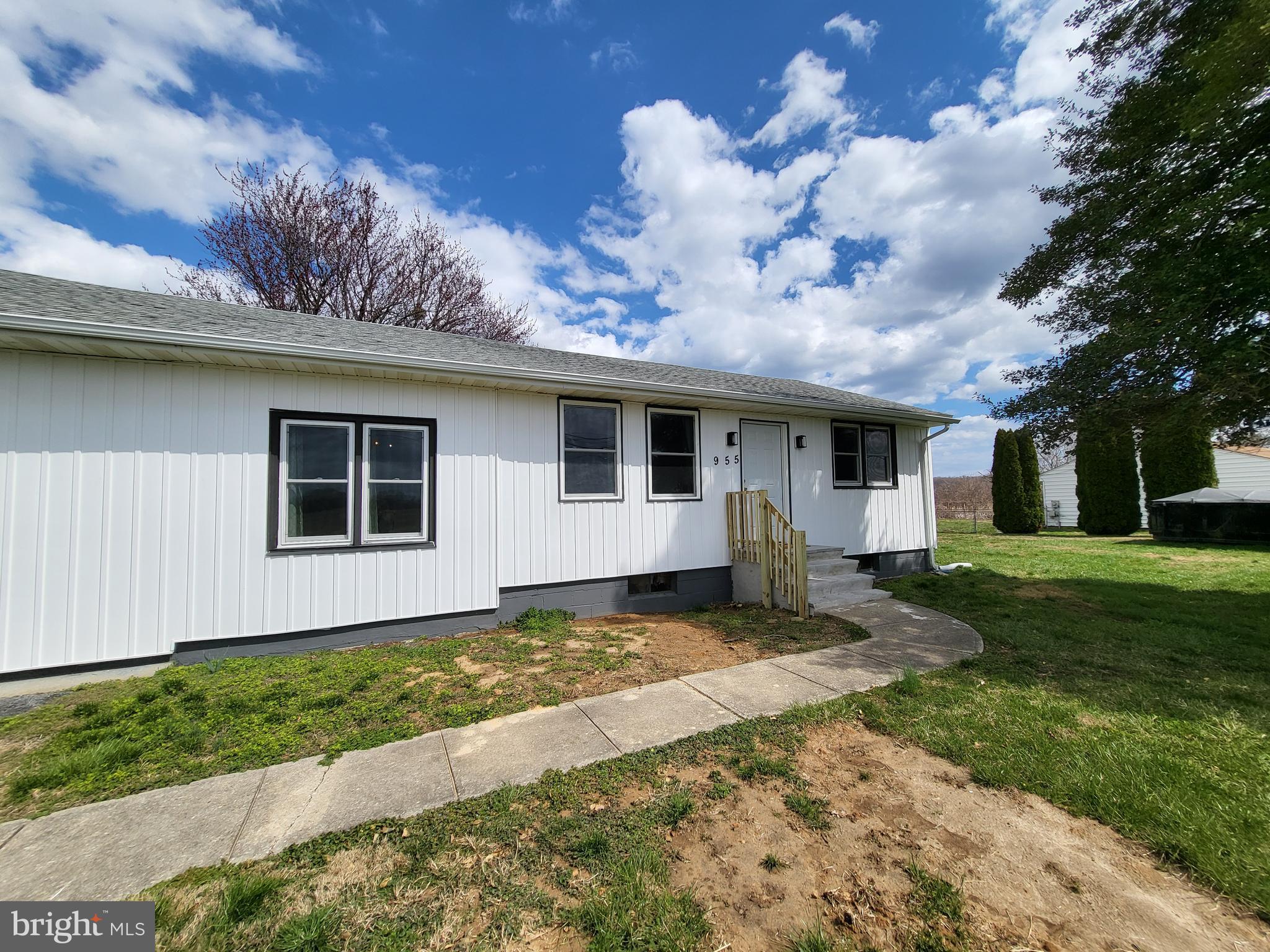 955 Kitts Hummock Road Dover, DE 19901 - Photo 2 of 16 a view of a house with a large window and a yard