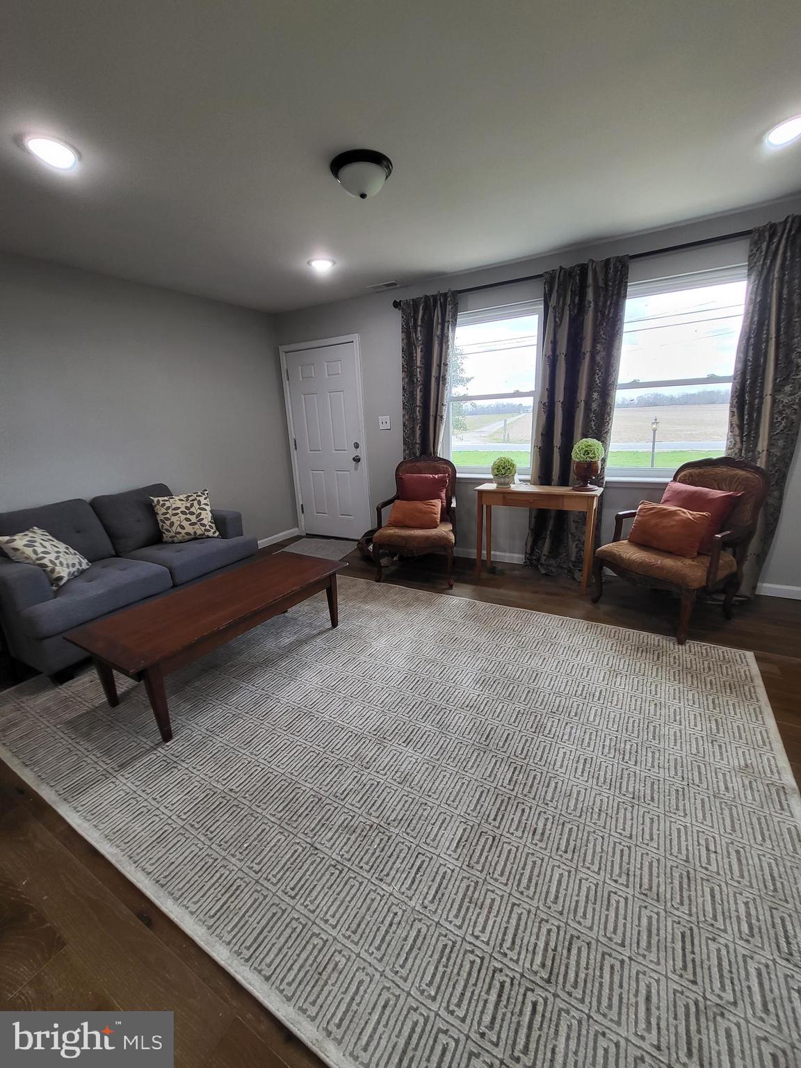 955 Kitts Hummock Road Dover, DE 19901 - Photo 3 of 16 a living room with furniture and a window