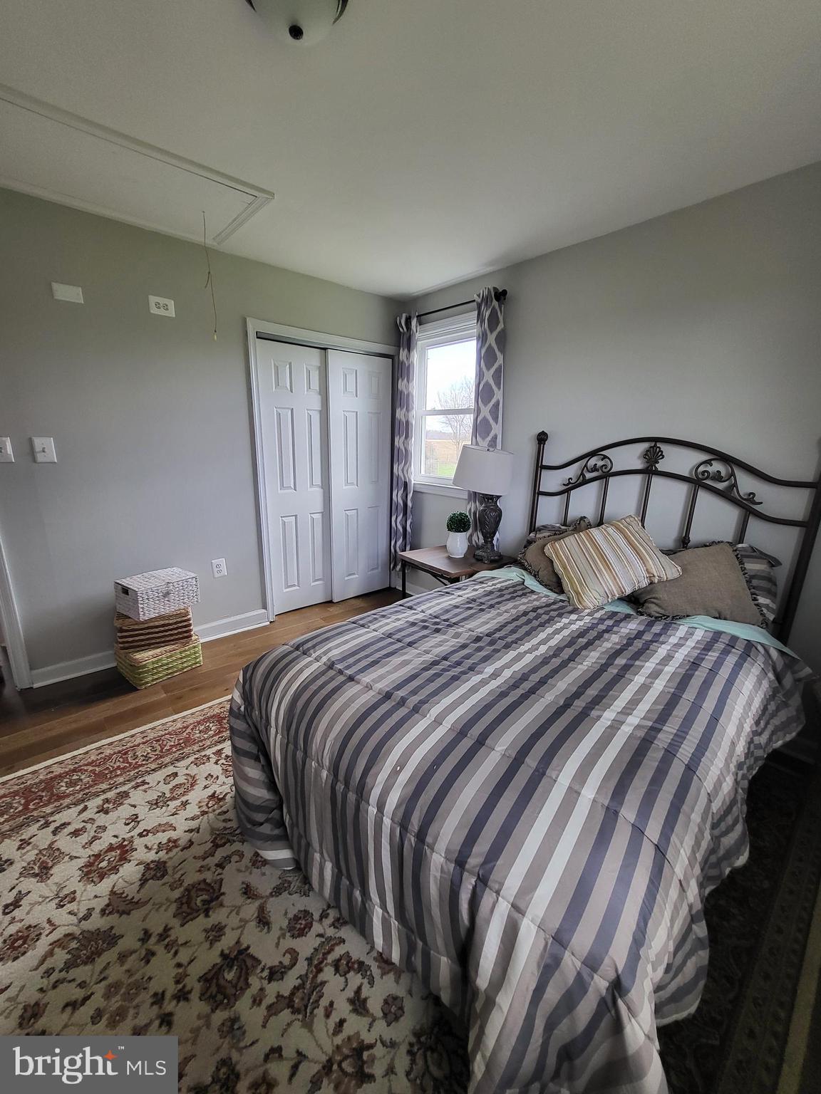 955 Kitts Hummock Road Dover, DE 19901 - Photo 9 of 16 a bedroom with a bed and wooden floor