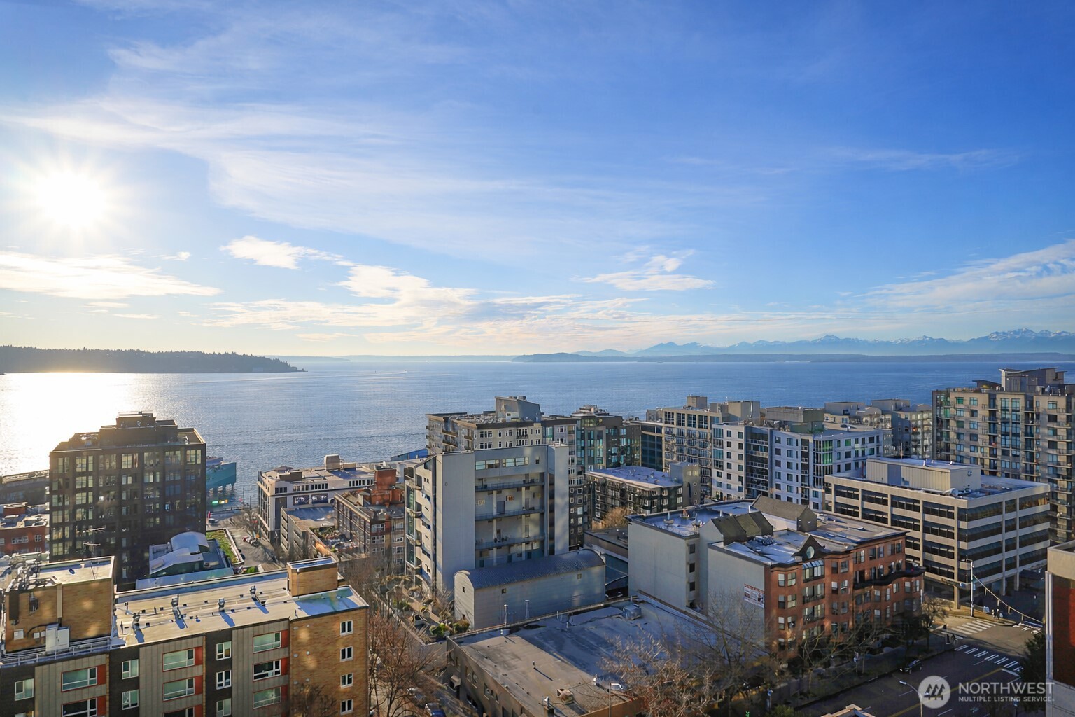 121 Vine Street, Unit 1702 Seattle, WA 98121 - Photo 11 of 37 a view of a city with tall buildings