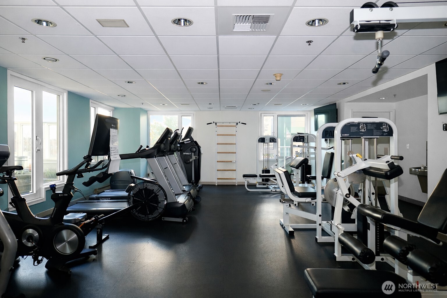 121 Vine Street, Unit 1702 Seattle, WA 98121 - Photo 23 of 37 a view of a room with gym equipment
