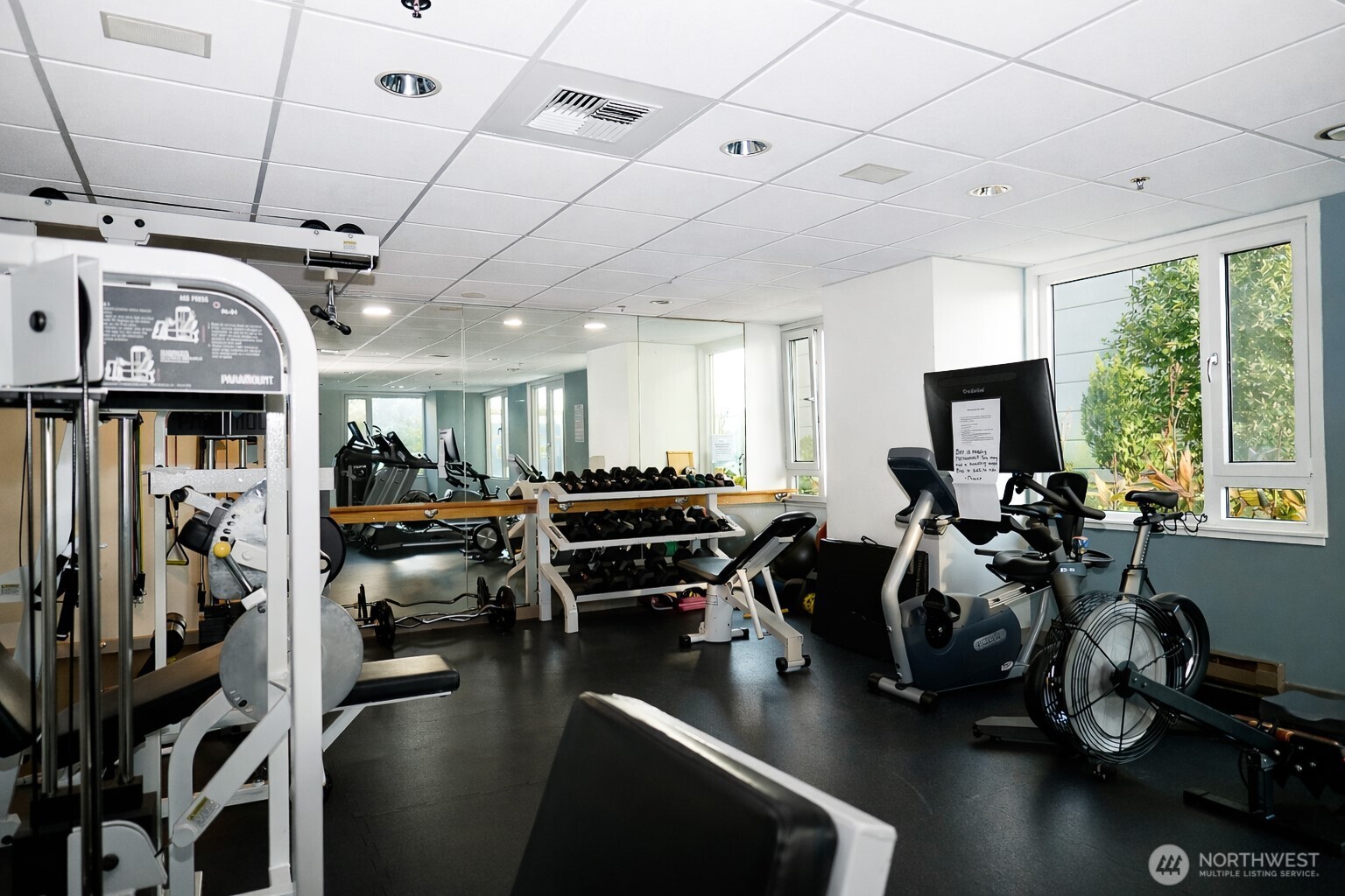 121 Vine Street, Unit 1702 Seattle, WA 98121 - Photo 24 of 37 a gym room with lots of gym equipment