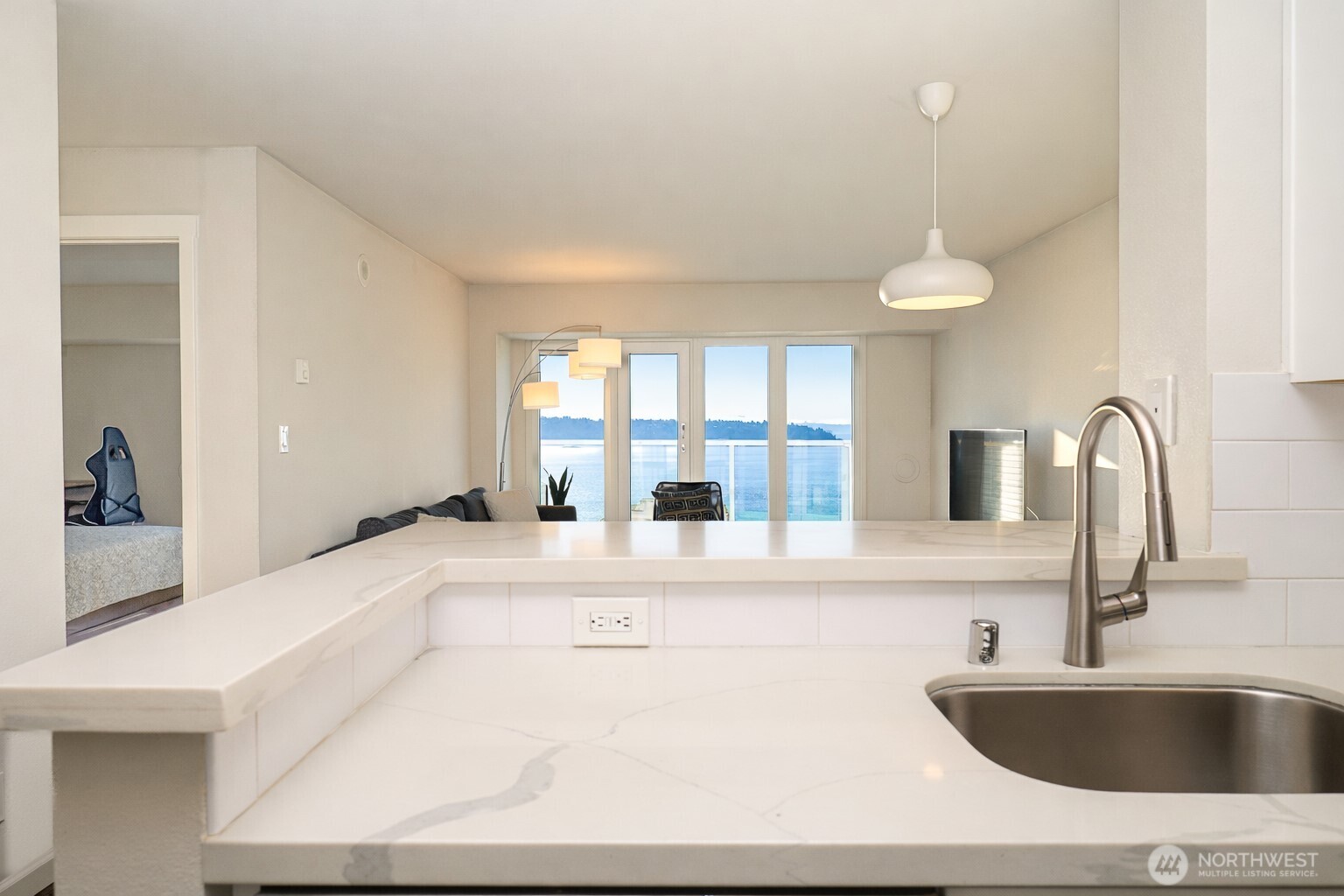 121 Vine Street, Unit 1702 Seattle, WA 98121 - Photo 5 of 37 a view of a kitchen with a sink and a dishwasher