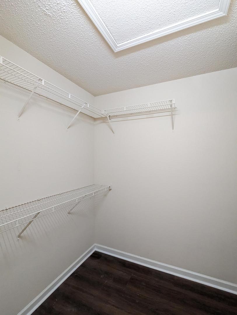 11370 Clubhaven Place Raleigh, NC 27617 - Photo 16 of 19 a view of a room with racks on the wall