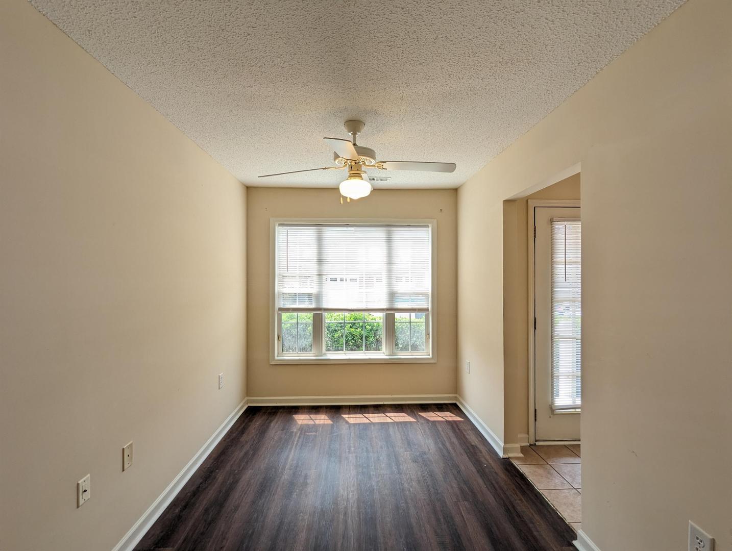 11370 Clubhaven Place Raleigh, NC 27617 - Photo 10 of 19 an empty room that has a window