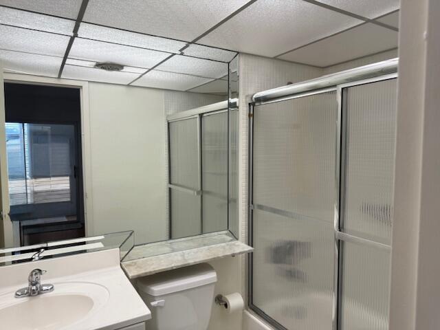 151 Tuscany Lane, Unit 151 Delray Beach, FL 33446 - Photo 3 of 4 a bathroom with a sink toilet and shower