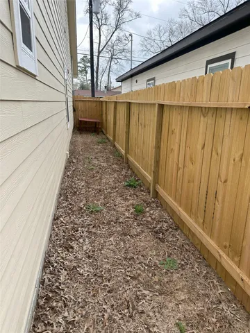 a view of a wooden fence
