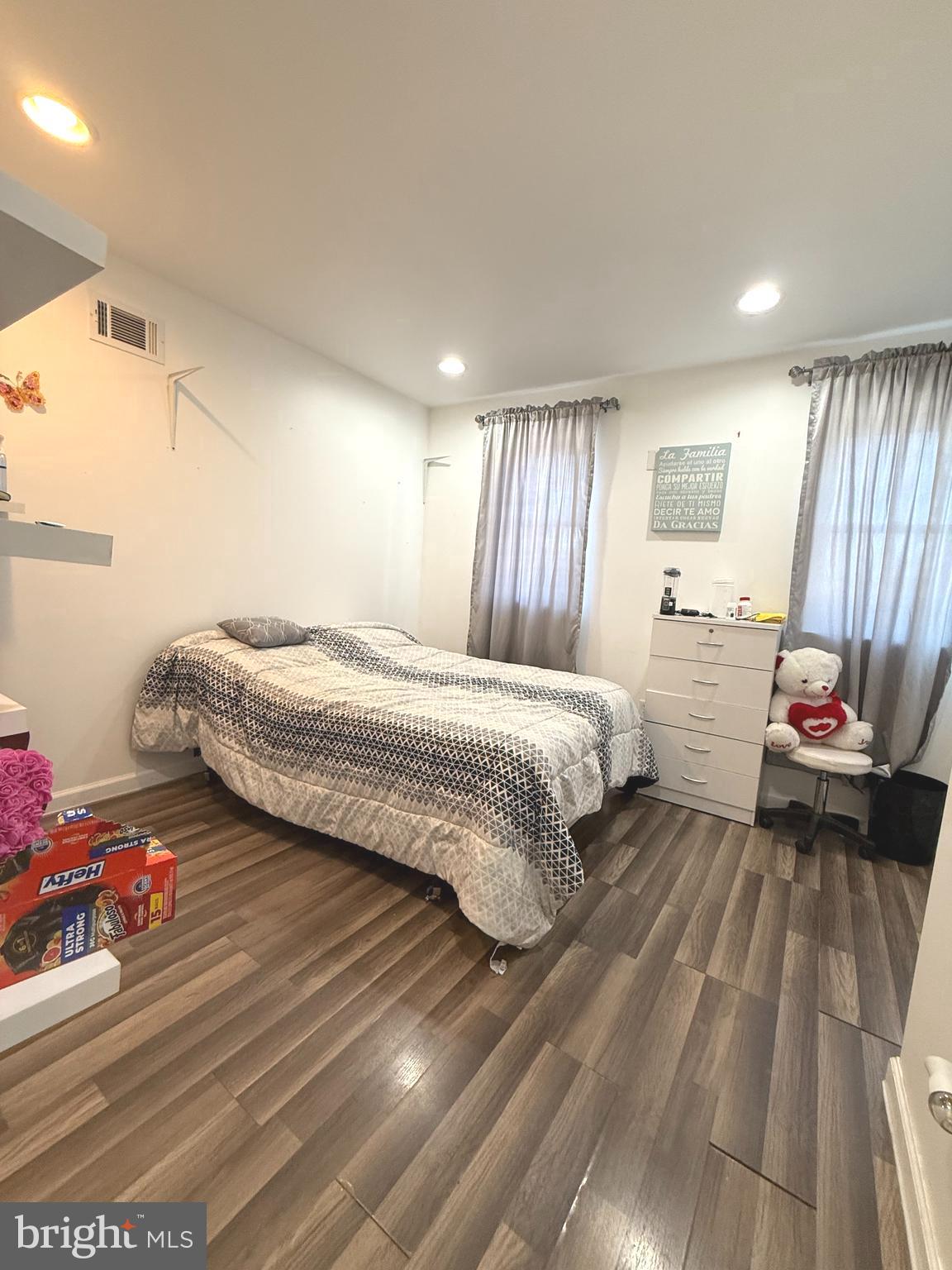 653 North 37th Street Philadelphia, PA 19104 - Photo 9 of 20 a bedroom with a bed and a dresser