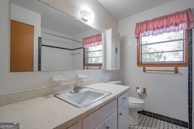 a bathroom with a shower and a tub