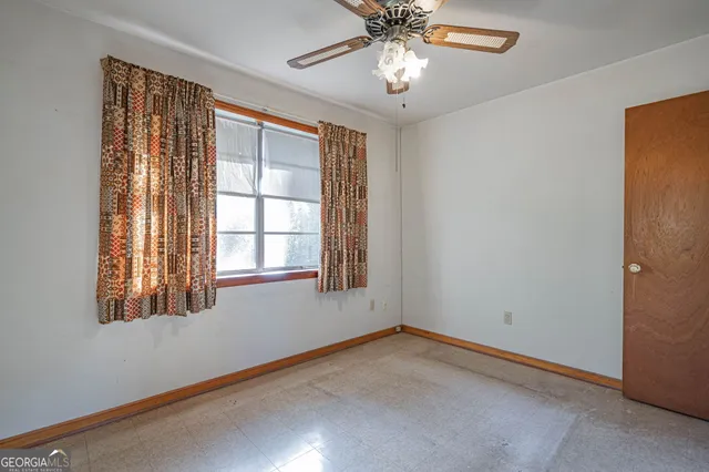 an empty room with a window