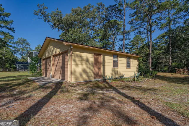 a house with trees in front of it